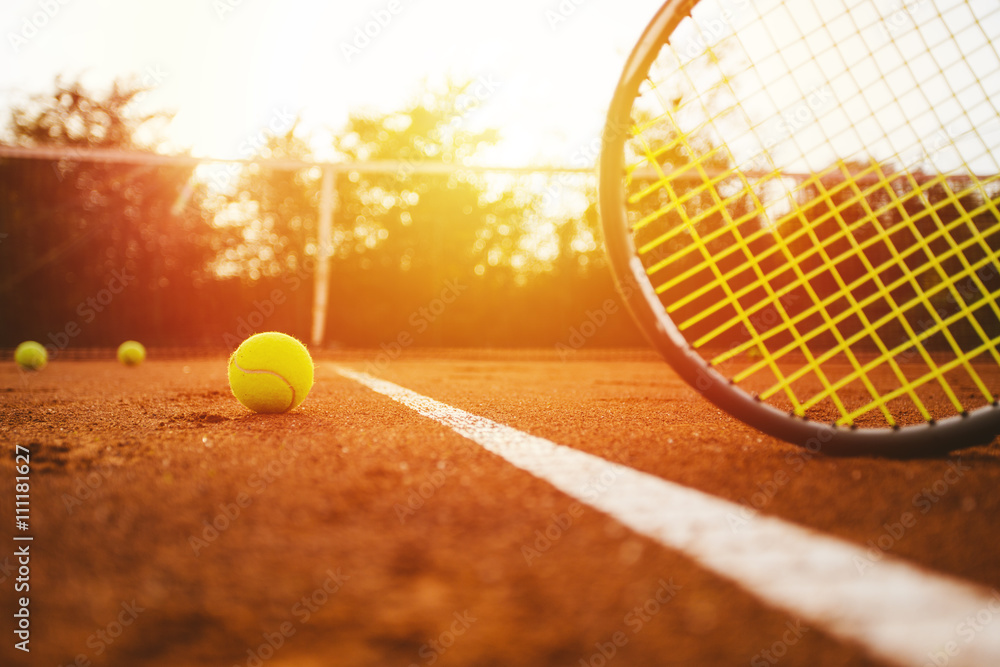Tennis ball and racket
