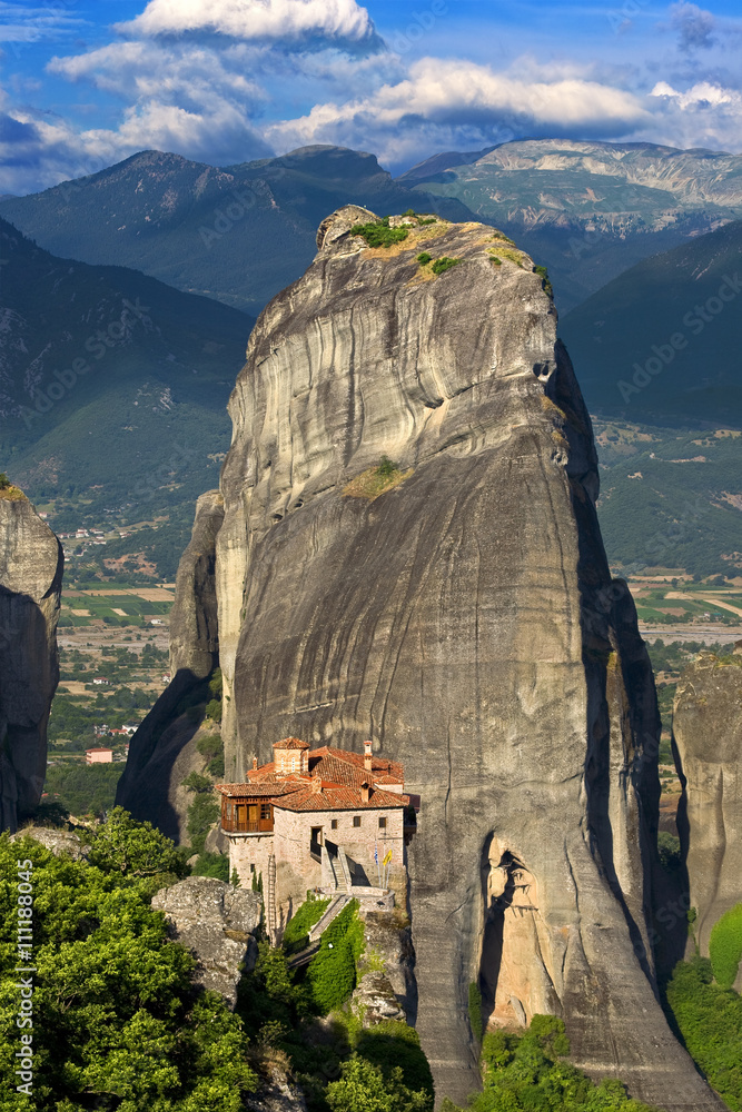Greece. Meteora (on UNESCO World Heritage List since 1988) - incredible sandstone rock formations rise from the ground and the monasteries on the top of rocks. The Holly Monastery of Rousanou - obrazy, fototapety, plakaty 