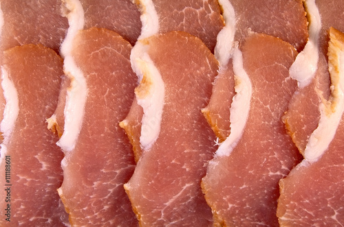 Slices of pork balyk (baked pork flesh) photo