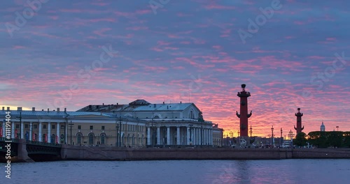 Russia, Saint-Petersburg, 19 May 2016: Timelapse of water area of Neva River at sunset, water mirror, reflections, Birzhevoy, Dvorcovy, Palace bridge, Stock Exchange Building, Rastralnye columns photo