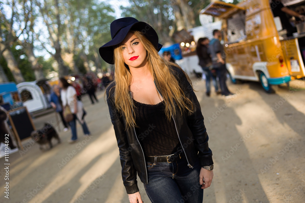 Beautiful young woman posing in the street. Beautiful young woman posing in the street.