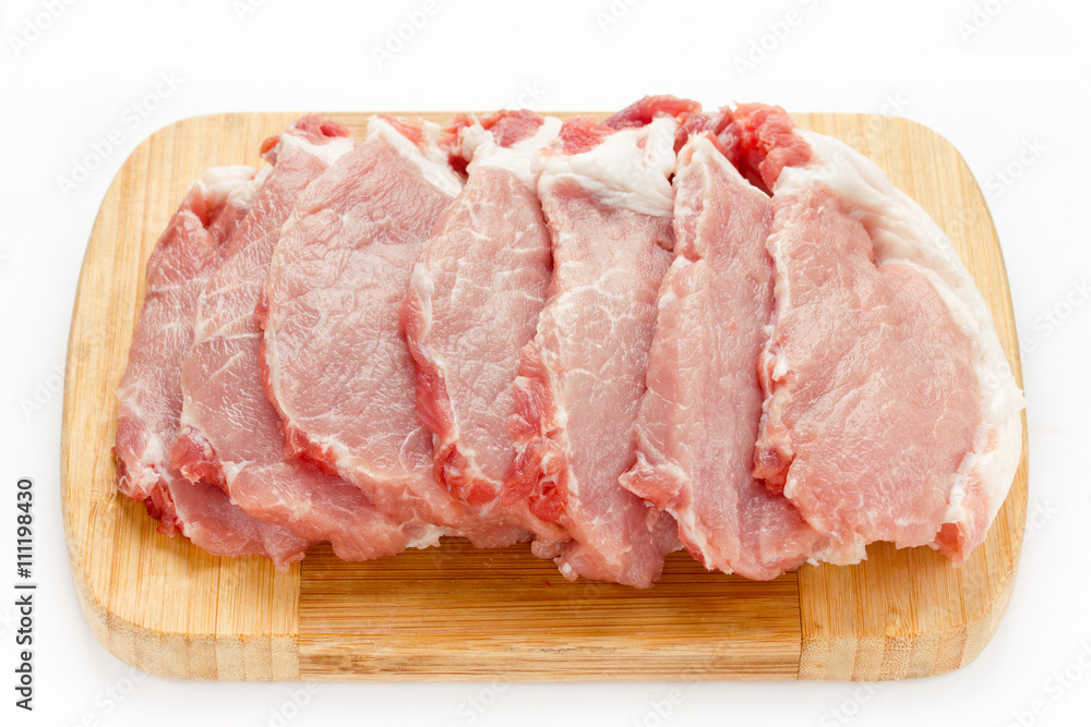 Raw meat pork steaks isolated on white background Raw meat pork steaks isolated on white background