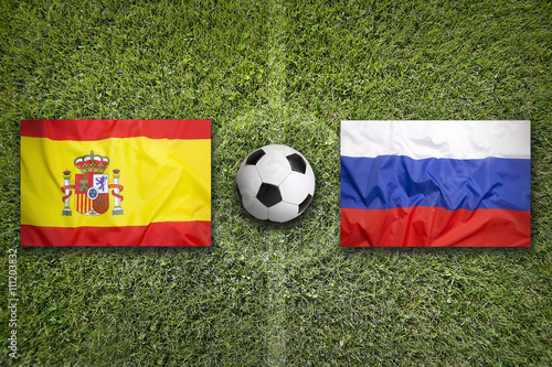 Spain vs. Russia flags on soccer field