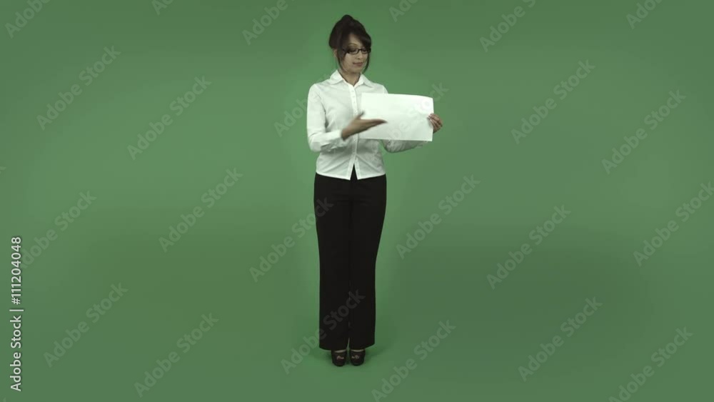 indian business woman isolated on green happy with blank sign indian business woman isolated on green happy with blank sign