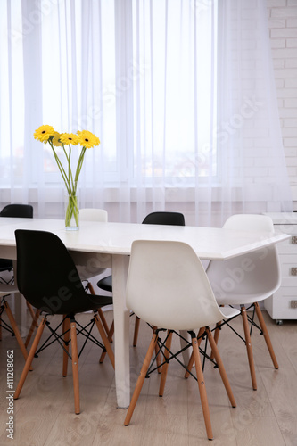 Beautiful interior with table and chairs photo