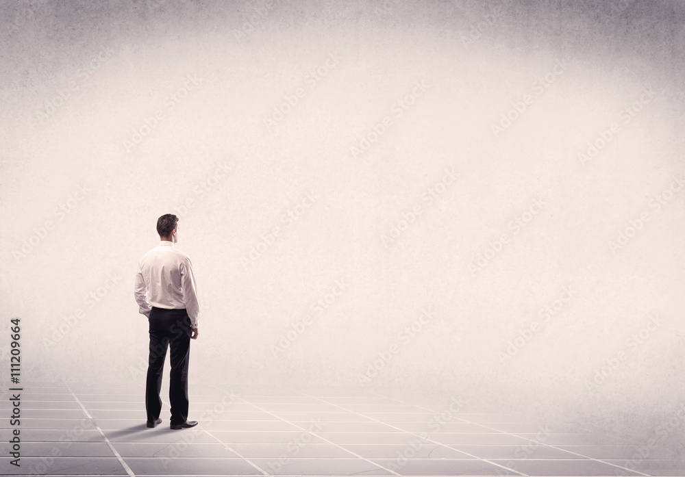 Business person standing in empty space Business person standing in empty space