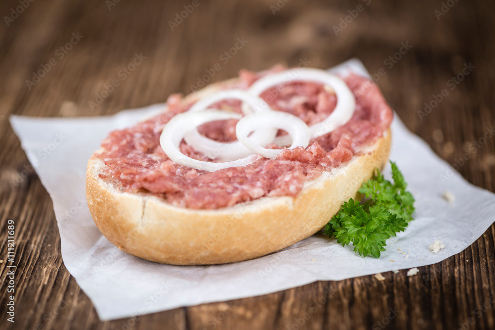 Fresh made Bun with Mett (selective focus) Fresh made Bun with Mett (selective focus)