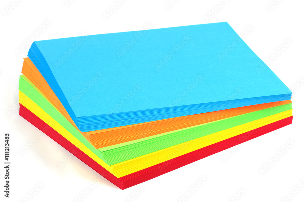 stacking colored papers isolated in white background stacking colored papers isolated in white background