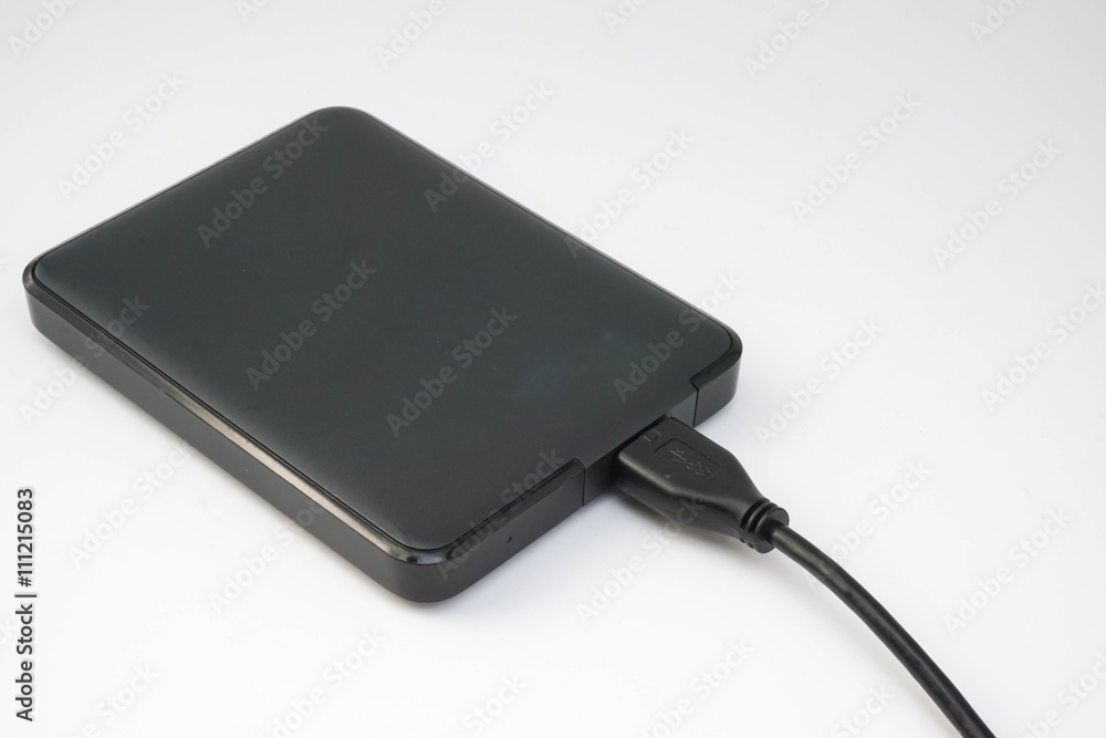 black external hard disk in white background black external hard disk in white background