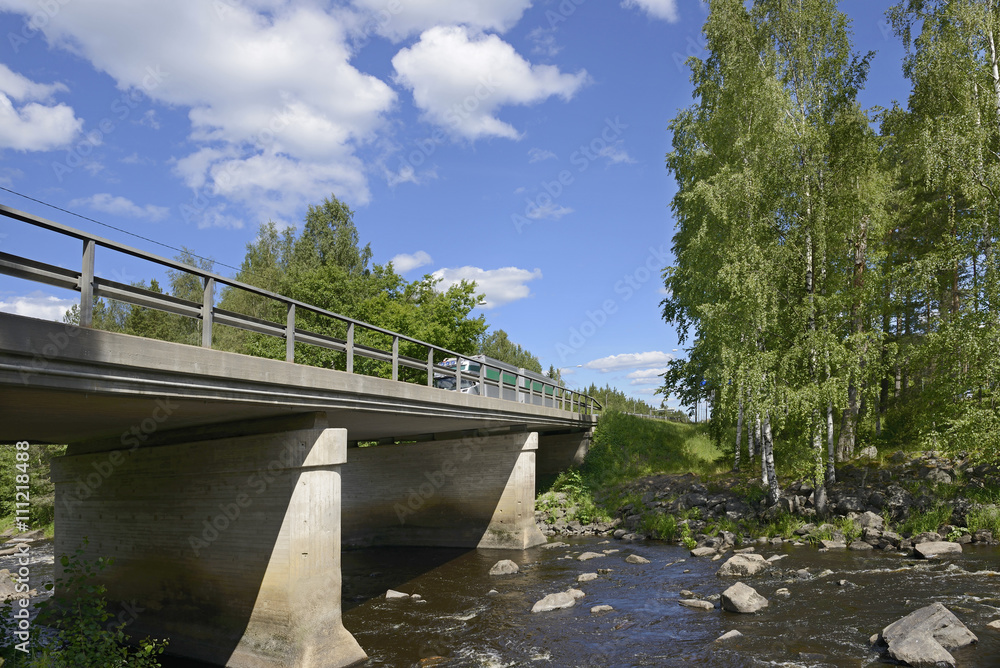 Bridge across northern river with rapids
