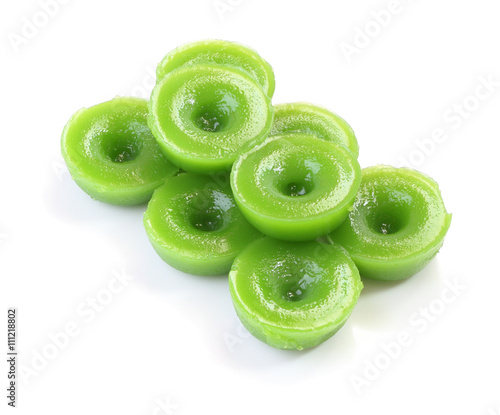 Valokuva Group of green multiple scented chinese sweet on white floor.