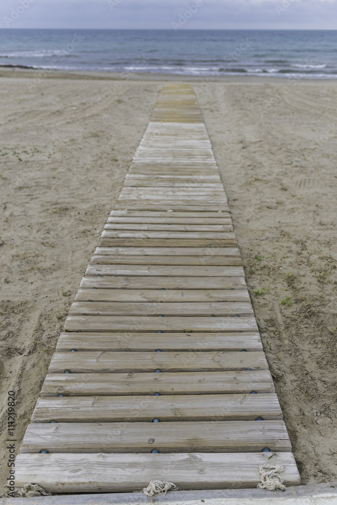 Wooden walkway on the beach.