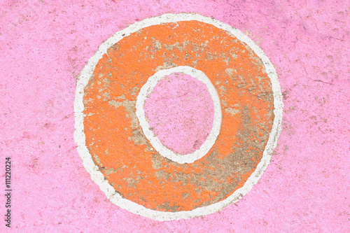 old word "O" sign on cement background