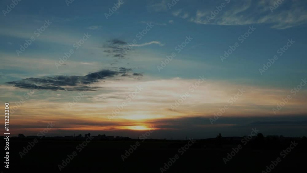 Time-lapse of sunset cloudy sky with modern cityscape of Prague Time-lapse of sunset cloudy sky with modern cityscape of Prague