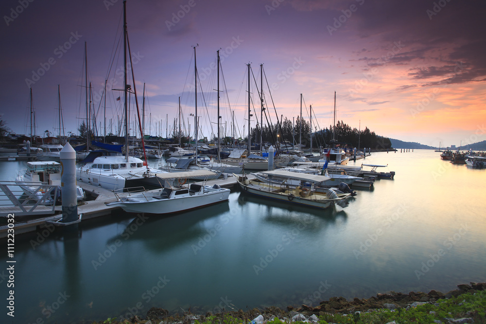 Beautiful composition view of Malaysian Harbour with a yatch dur