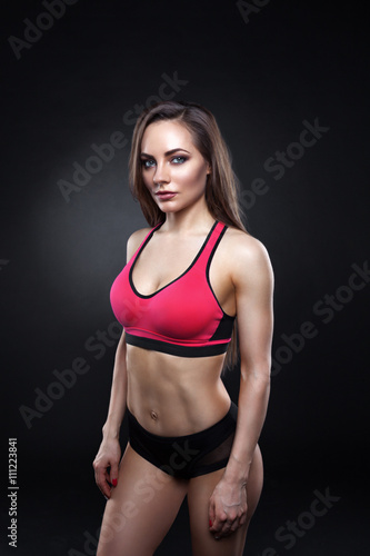 Fitness female looking at camera