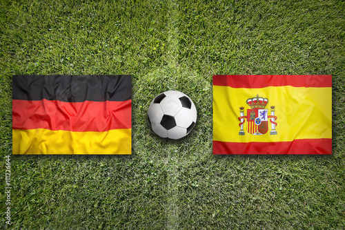 Germany vs. Spain flags on soccer field