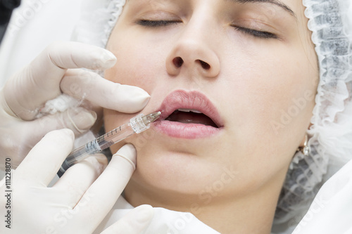 young girl in a clinic contour lips procedure