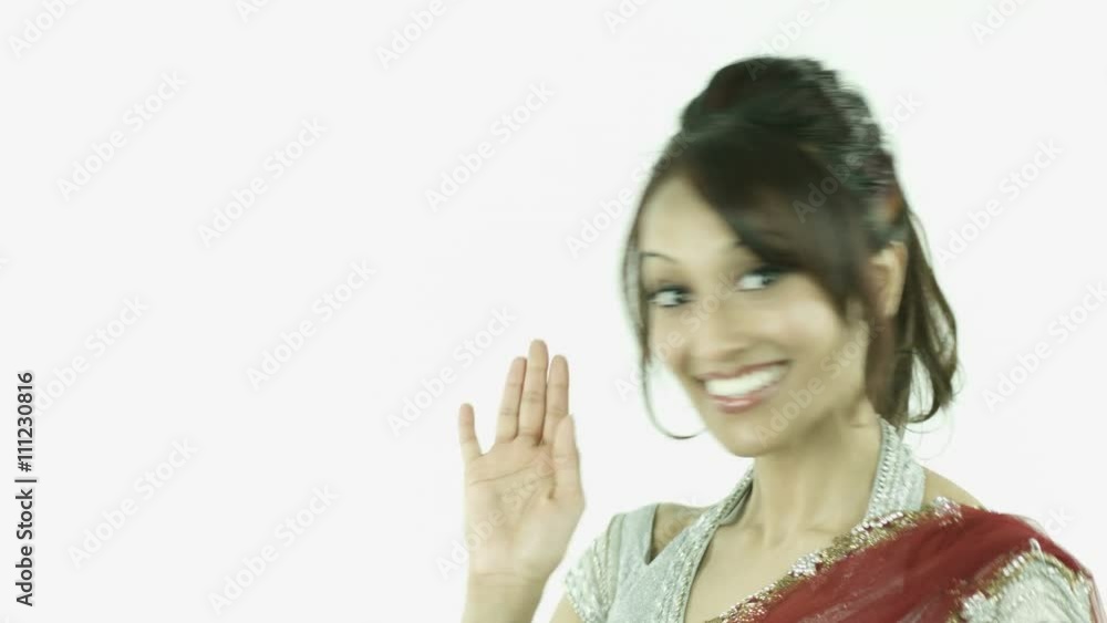 woman in traditiona indian outfit isolated on white waving greetings woman in traditiona indian outfit isolated on white waving greetings