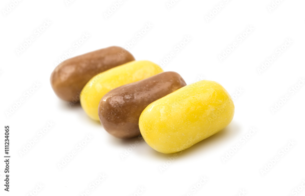 Fototapeta premium yellow pills isolated
