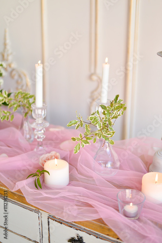 wedding candles and flowers on table 