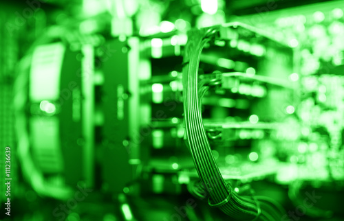 Fototapeta Horizontal green gpu quad sli video card bokeh background