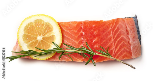 Fresh raw salmon fillet with lemon and rosemary isolated on whit