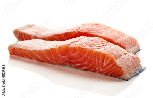 Fresh raw salmon fillet isolated on white