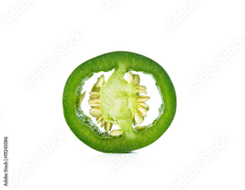 Green pepper slices on a white background