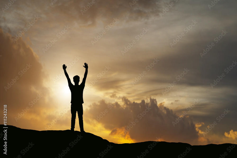 silhouette of man show arm up for achievements successful and ce