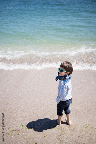 little boy at the shore photo