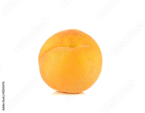 One ripe peach on white background