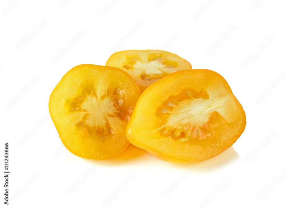yellow cherry tomatoes on white background