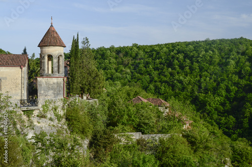 landscape with old church on the green hill