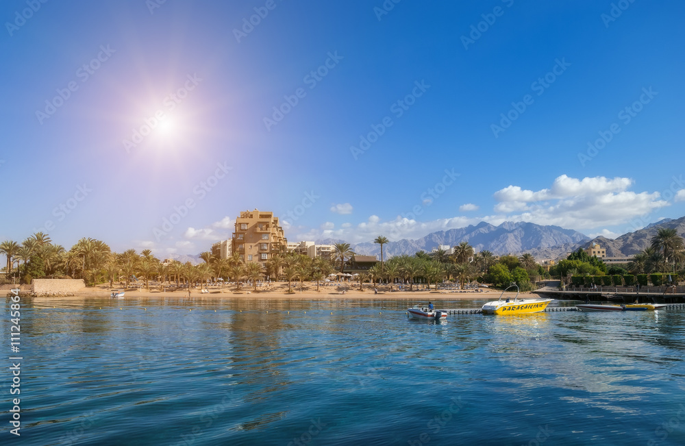 Jordanian boatmen waiting for tourists in the harbor of Aqaba, Jordan