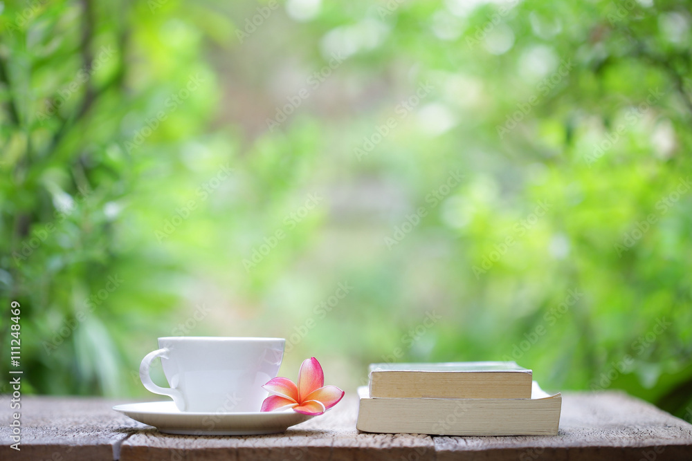 Notebook with pencil and cup on wooden table Notebook with pencil and cup on wooden table