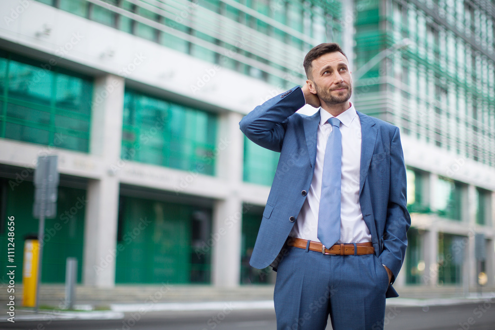 crisis times: businessman walking down the street crisis times: businessman walking down the street