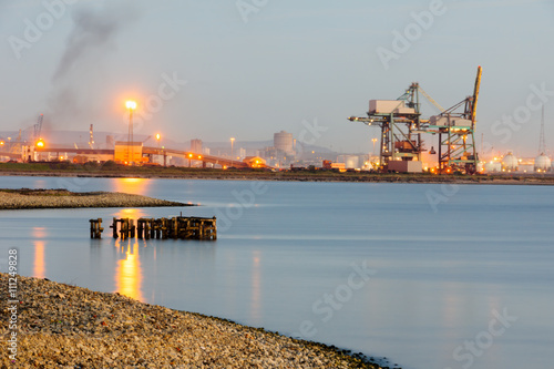 factory and nature in twilight