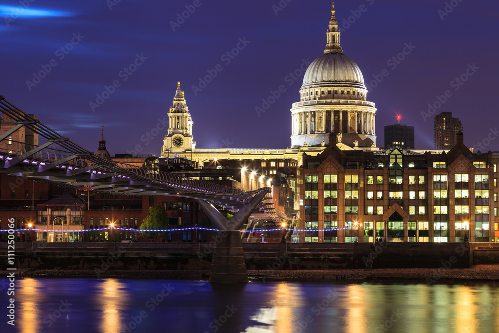 Millennium Bridge leading to Saint Paul's Cathedral during sunset