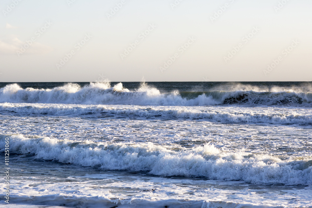 The waves of the Pacific ocean, the beach landscape. The ocean and waves during strong winds in United States, Santa Monica.
