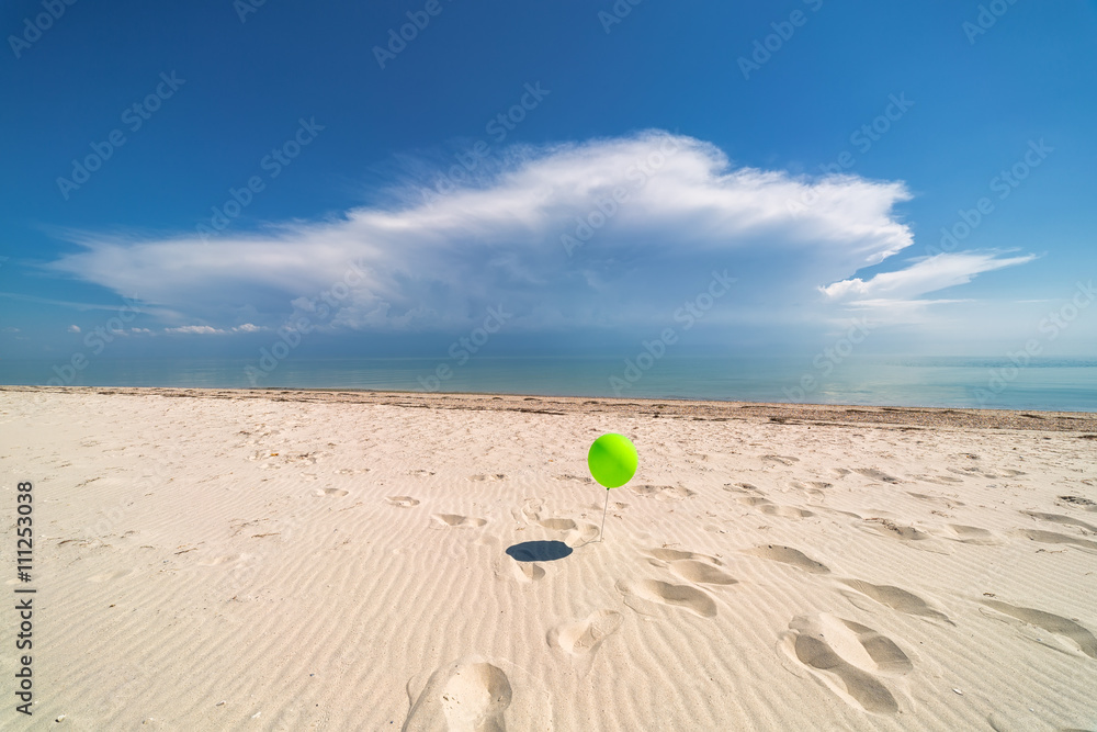 Balloon on background of ocean. Beach. Clouds Balloon on background of ocean. Beach. Clouds