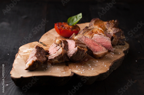 Fotografie Sliced medium rare grilled Black Angus Steak Ribeye