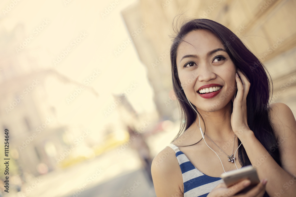 Happy girl listening to music