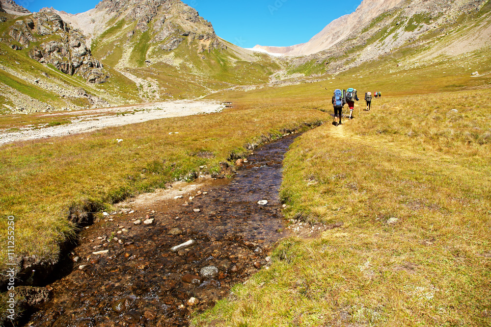 Group of hikers in the mountain Group of hikers in the mountain