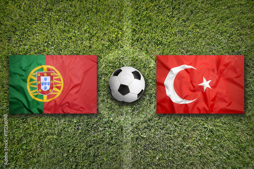 Portugal vs. Turkey flags on soccer field