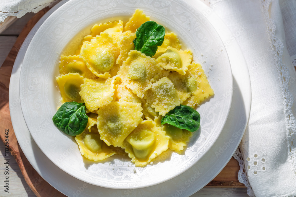 Closeup of tasty ravioli with spinach, ricotta and parmesan