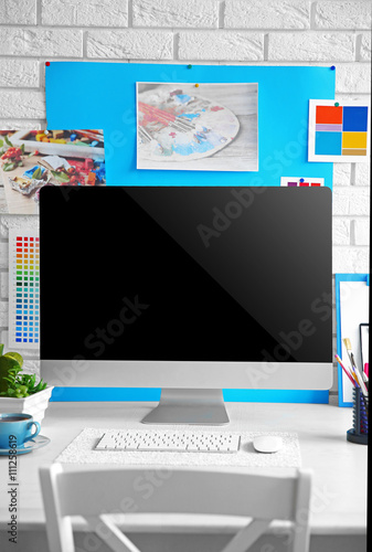 Stylish bright workplace of...