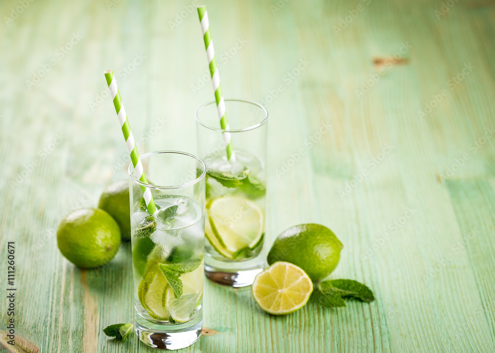 Fototapeta premium Lemonade drink on a wooden background