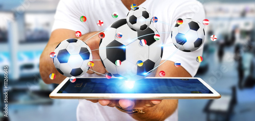 фотографія Businessman holding football in his hand