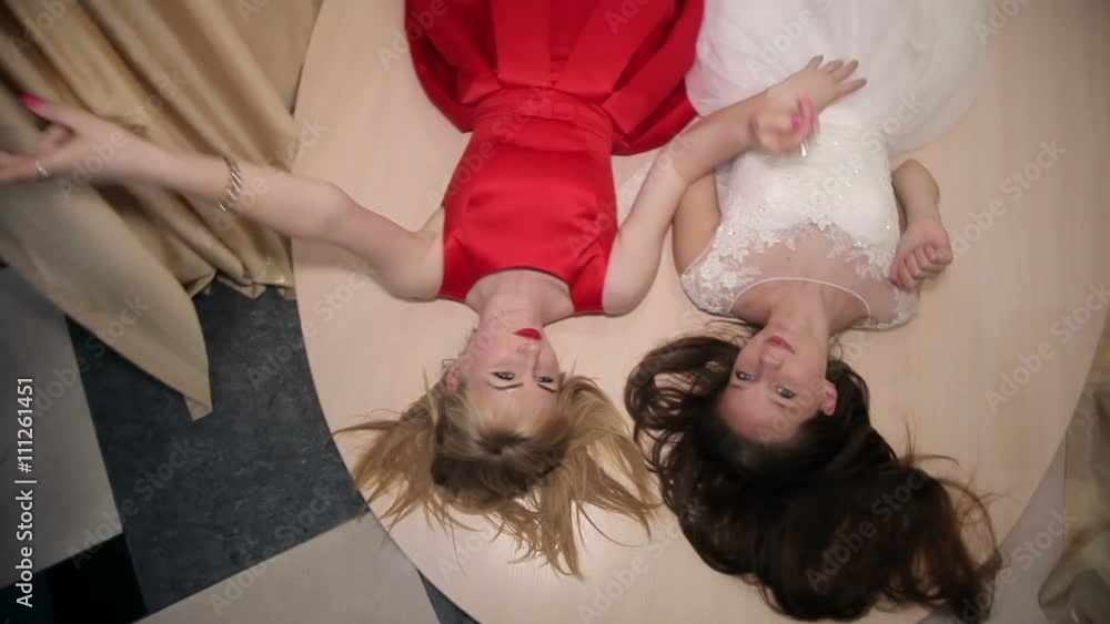 Bride with girlfriend having fun and indulge Bride with girlfriend having fun and indulge